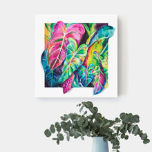 Load image into Gallery viewer, Colorful elephant ear canvas art hangs on a white wall